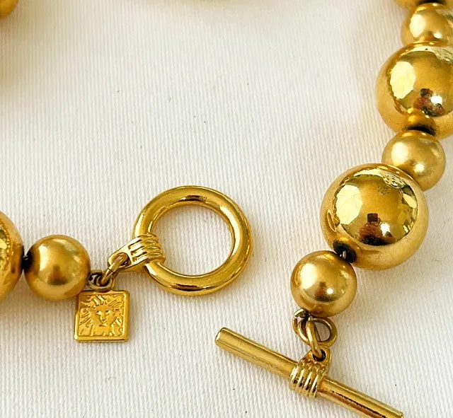 80s signed Ann Klein shiny gold metal beaded necklace.