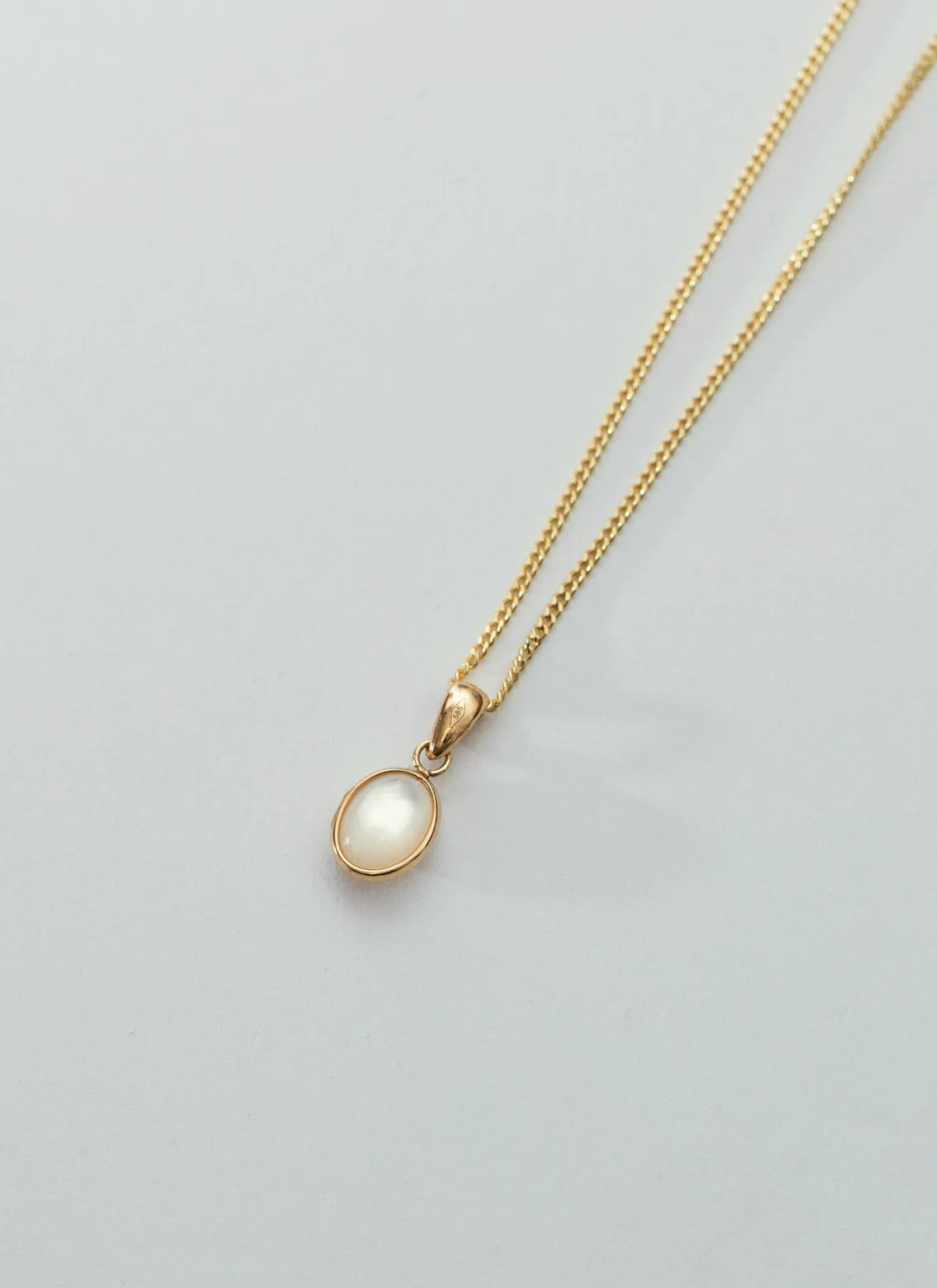 Mother of pearl charm 14k gold